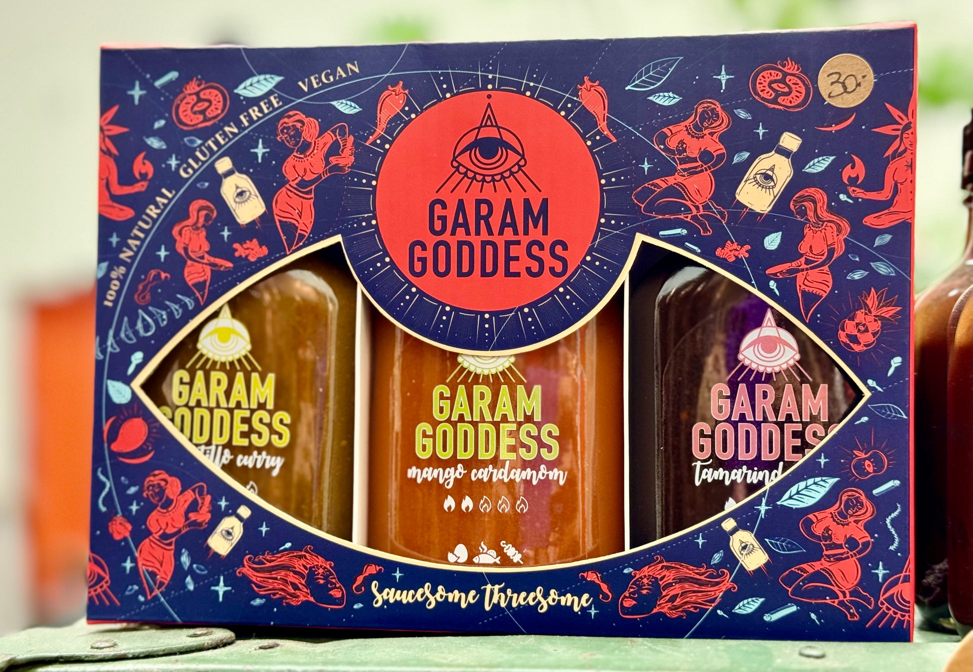 Garam Goddess' iconic ‘Saucesome Threesome’ gift set featuring 100ml bottles of Tomatillo Curry, Mango Cardamom, and Tamarind Cumin hot sauces
